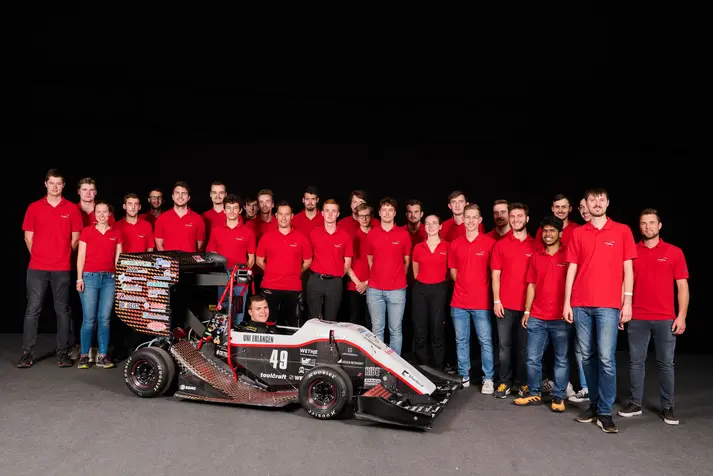 Team of FAU Erlangen-Nuremberg with electric Formula Student race car featuring Nanotec drive technology