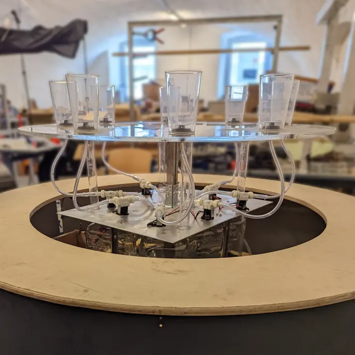 Development of a drink tap system » The inner part moves a stepper motor + gear wheel + lead screw connection up and down by means of an app.